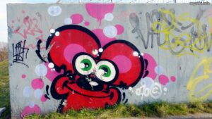 Graffiti: Myszka na betonowym murze, Katowice, ul. Graniczna (2021-03-30)