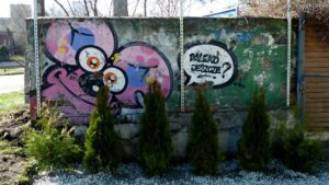 Graffiti: Myszka na murze, Łaziska Górne, ul. Cieszyńska, DK81 (2024-03-26)